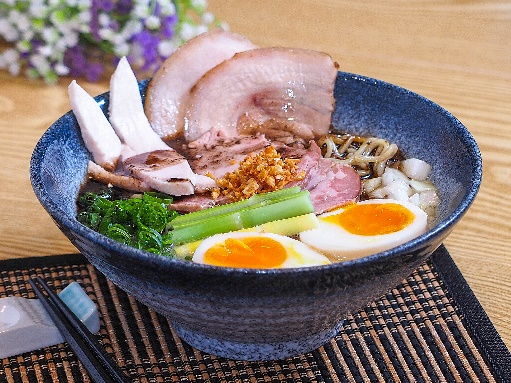 Photo of bowl of Black Garlic Ramen in Japanese restaurant in South Yarra